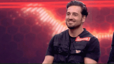 Man In Black Shirt With Bravo Sticker GIF