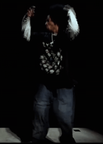 Man In Black Shirt With Chinese Writing Dancing GIF
