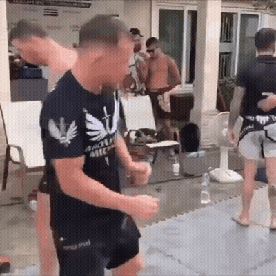 Man In Black Shirt With Cross Dancing GIF