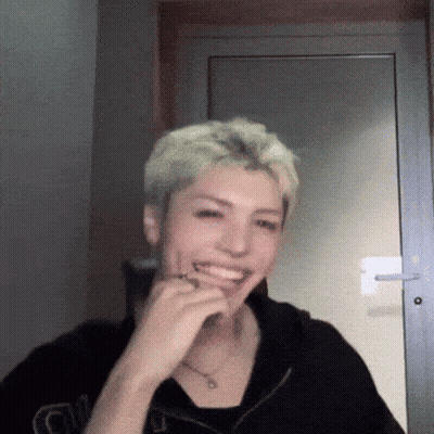 Man In Black Shirt With G Laughing GIF
