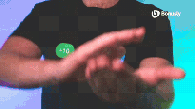 Man In Black Shirt With Green Bonusly Sticker GIF