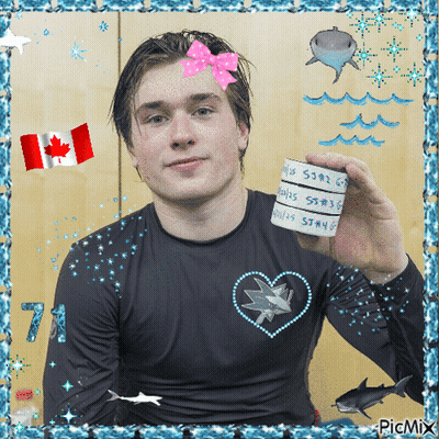 Man In Black Shirt With Hearts And Sharks Holding Paper GIF
