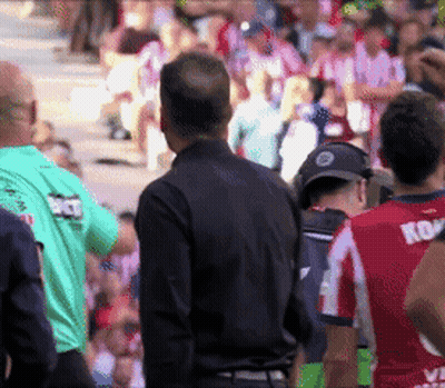 Man In Black Shirt With Ko On Back GIF