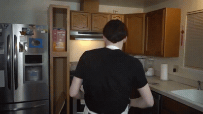 Man In Black Shirt With Kraft Mac And Cheese On Fridge GIF