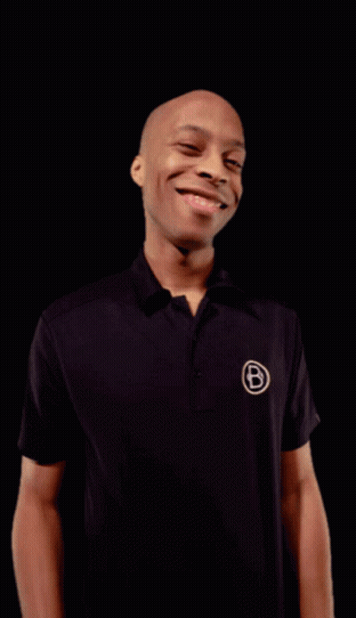 Man In Black Shirt With Letter B Smiles GIF