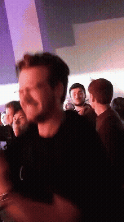 Man In Black Shirt With Letter C GIF