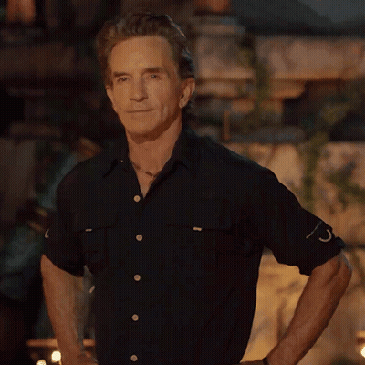 Man In Black Shirt With Letter C On Sleeves GIF