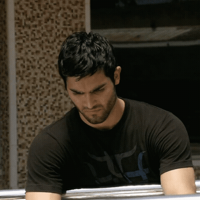 Man In Black Shirt With Letter F GIF