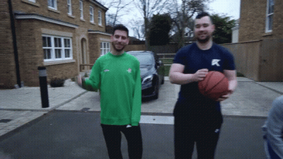 Man In Black Shirt With Letter K GIF