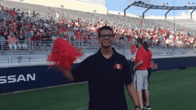 Man In Black Shirt With Letter S GIF