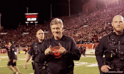Man In Black Shirt With Letter T Thumbs Up GIF