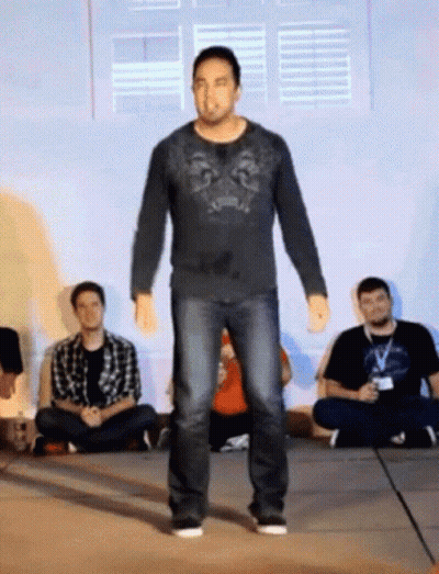 Man In Black Shirt With Lion GIF