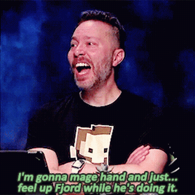 Man In Black Shirt With Minecraft Logo Laughing GIF