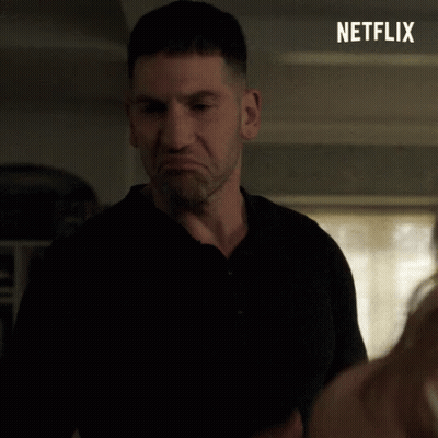 Man In Black Shirt With Netflix Logo GIF