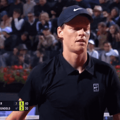Man In Black Shirt With Nike Logo On Sleeve GIF
