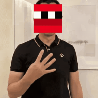 Man In Black Shirt With Red Pixelated Face Behind Him GIF