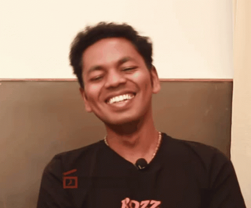 Man In Black Shirt With Rozz Smiling GIF