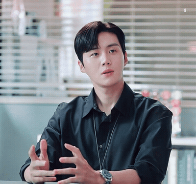 Man In Black Shirt With Watch Hands Outstretched GIF