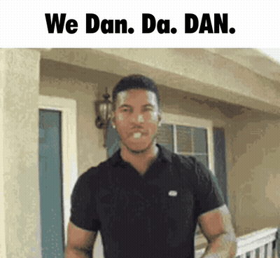 Man In Black Shirt With We Dan Da Dan Above Him GIF