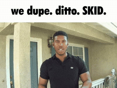 Man In Black Shirt With We Dupe Ditto Skid Above Him GIF