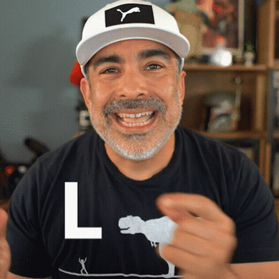 Man In Black Shirt With White Letter L GIF