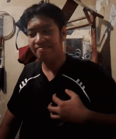 Man In Black Shirt With White Stripe GIF
