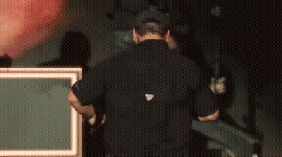 Man In Black Shirt With White Triangle GIF