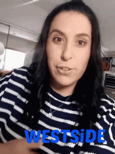 Man In Black Skull Shirt Serving Food To Woman GIF