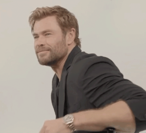 Man In Black Suit And Silver Watch GIF