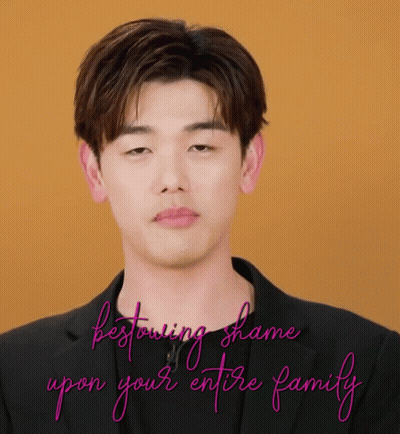 Man In Black Suit Bestowing Shame Upon Your Entire Family GIF
