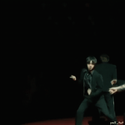 Man In Black Suit Dancing As Another Watches GIF