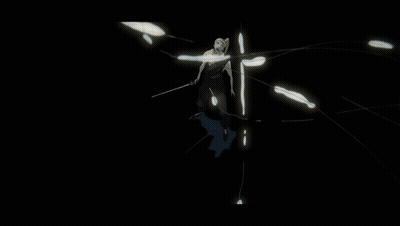 Man In Black Suit In Front Of Large Sculpture GIF