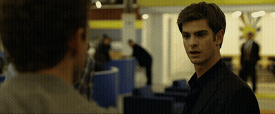 Man In Black Suit Looking At Another Man GIF