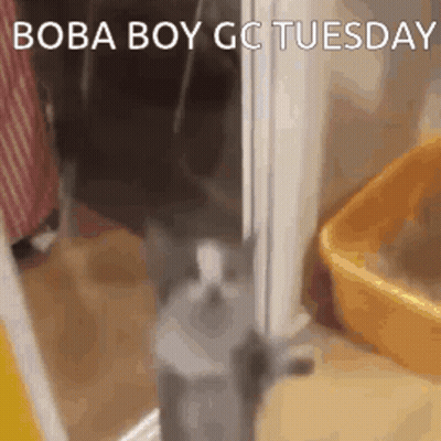 Man In Black Suit Looking Out Window GIF