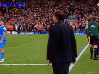 Man In Black Suit On Soccer Field With Scoreboard Liv 3 2 Atm GIF