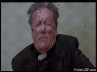Man In Black Suit Sitting On Toilet GIF