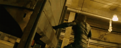 Man In Black Suit Standing GIF