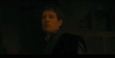 Man In Black Suit Standing GIF