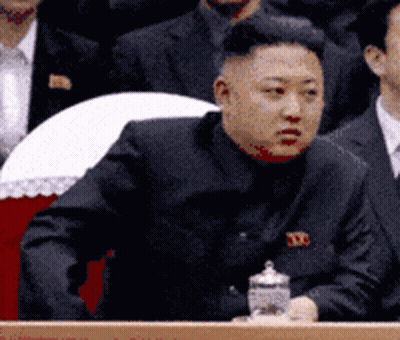 Man In Black Suit With TD Badge GIF