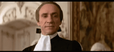 Man In Black Suit With White Lapel Tie GIF