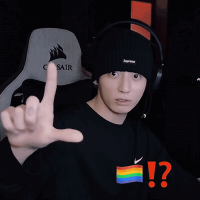 Man In Black Supreme Beanie And Black T-Shirt GIF