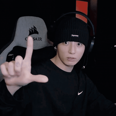 Man In Black Supreme Beanie Pointing At Camera GIF