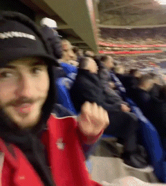 Man In Black Supreme Hat At Stadium GIF