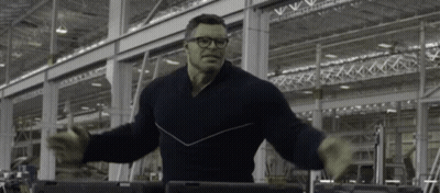 Man In Black Sweater And Glasses In Factory GIF