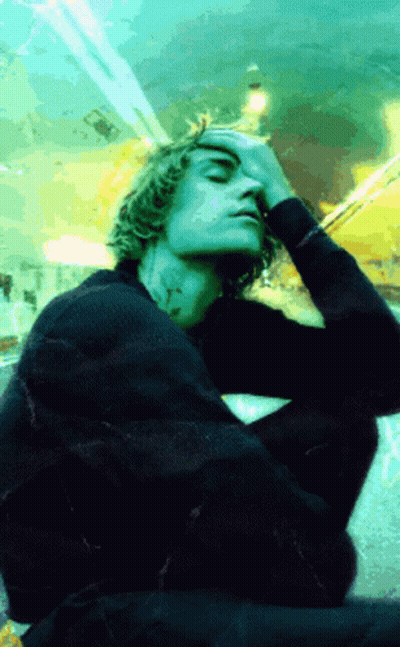 Man In Black Sweater Hand To Face GIF
