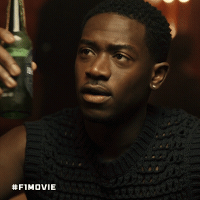 Man In Black Sweater Holding Beer GIF