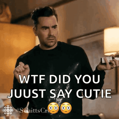 Man In Black Sweater Holding Bottle Says WTF Did You Just Say Cutie GIF