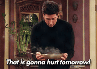 Man In Black Sweater Holding Bowl Saying That Is Gonna Hurt Tomorrow GIF