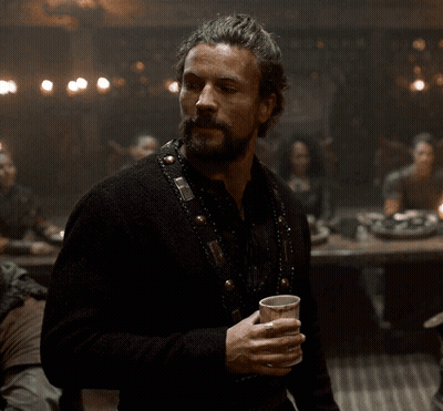 Man In Black Sweater Holding Cup GIF