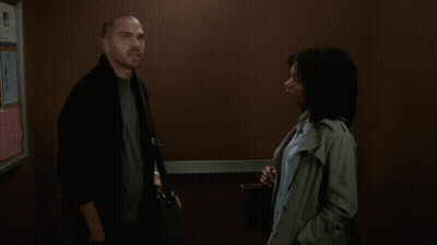 Man In Black Sweater In Elevator GIF